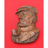 sculpture bois tete homme fumant la pipe SIC